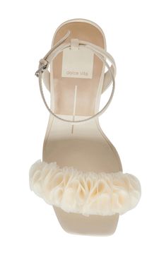 Voluminous ruffles add modern elegance to the vamp of a soirée-ready sandal framed by a squared-off toe and flared block heel. 3 1/4" heel (size 8.5) 3" strap height Adjustable ankle strap with buckle closure Leather and textile upper/synthetic lining and sole Imported Low Heel Heels For Spring Gala, Spring Gala Heels With Sculpted Heel, Chic Fitted Sandals With Block Heel, Chic Block Heels With Sculpted Heel For Parties, Chic Block Heel Heels For Gala, Chic Party Block Heels With Stacked Heel, Chic Block Heels With Padded Heel For Gala, Chic Low Heel Heels For Events, Chic Summer Wedding Heels