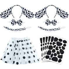 three pieces of clothing with black and white polka dots on them