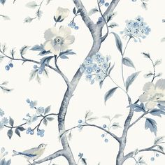 a blue and white floral wallpaper with birds on the branches, flowers and leaves