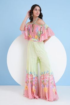 Pink and green jumpsuit with ruched cut-out bodice on a floral print base. - Aza Fashions Green Floral Print Jumpsuits And Rompers For Party, Jumpsuit For Women, Blossom Print, Print Jumpsuit, Green Jumpsuit, Printed Jumpsuit, Aza Fashion, Halter Neck, Jumpsuits For Women