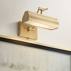 a light fixture mounted on the side of a wall