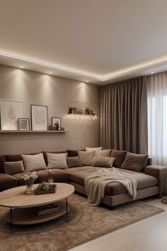 a living room filled with lots of furniture next to a window covered in drapes