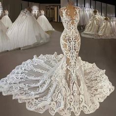 a white wedding dress on display in a store