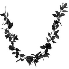 a black and white photo of a necklace with flowers