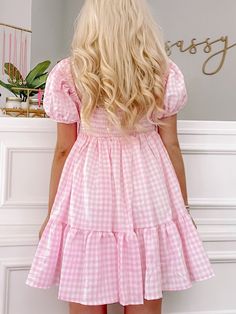 Meet the Pretty Privilege Dress from Sassy Shortcake! Featuring a classic pink gingham pattern, babydoll silhouette, puff sleeves, and an oh-so-cute front tie. Show off your fun, flirty style and add a little sass to your wardrobe! Lined. Also available in blue. fit: runs true to size (model wearing a size small) Pink Babydoll Dress Outfit, Lsf Aesthetic, Party Mini Dresses, Sassy Shortcake, Pink Plaid Dress, Adorable Dresses, Pink Gingham Dress, Flirty Style, Babydoll Dresses