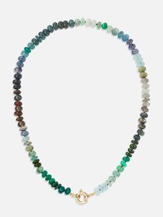 The Encirkled Camo Gemstone Beaded Necklace is the ultimate addition to your neck stack, featuring a 14k spring ring closure, that is perfect for displaying your favorite charms. 8mm assorted gemstones that may include agate, amber, aquamarine, aventurine, cat's eye, chocolate moonstone, chrysoprase, emerald, fluorite, chrysocolla, green onyx, jasper, labradorite, malachite, pyrite, sapphire, smoky quartz, tourmilated quartz Gemstone card comes with each necklace with list of included gemstones Adjustable Necklace With Gemstone Accents, Single Strand Agate Round Necklace, Single Strand Round Agate Necklace, Rondelle Agate Jewelry With Natural Stones, Agate Rondelle Natural Stone Jewelry, Fine Jewelry Gemstone Necklaces With Round Beads, Faceted Round Agate Bead Jewelry, Fine Jewelry Necklaces With Round Natural Stones, Fine Jewelry Necklaces With Round Gemstone Beads