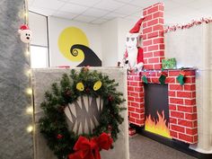 an office decorated for christmas with wreaths and decorations