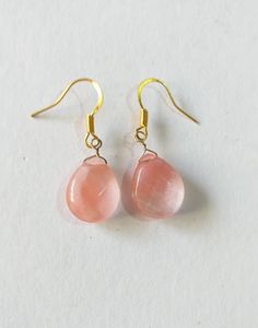 gold Cherry Rose quartz earrings Victorian earrings Boho teardrops earrings Bohemian Gold pink Cherry Quartz earrings rose pink wedding gift Gold-tone Tourmaline Cherry Rose Quartz faceted teardrop shaped Victorian earrings . Bohemian earrings . Beautiful earrings made from Tourmaline Cherry Quartz and gold-tone metal elements . Antique style pink earrings. Victorian style earrings. Boho earrings . Romantic earrings. Beautiful earrings with rose pink cherry quartz.  Perfect Gift for girlfriend, mother, sister, bride , bridesmaids or Maid of honor. Gift for special people or jewelry set for your special occasion . Same style jewelry set is available in options menu.  FREE SHIPPING  Material: Cherry Quartz, gold- toned metal ornaments ,gold toned chain. Length of necklace:  18.20 ( 46 cm), p Pink Dangle Teardrop Earrings For Gift, Pink Teardrop Earrings For Gift, Delicate Pink Drop Jewelry, Pink Wire Wrapped Teardrop Earrings, Pink Rose Quartz Jewelry With Ear Wire, Gold Teardrop Rose Quartz Jewelry, Pink Rose Quartz Earrings Gift, Pink Rose Quartz Earrings For Gifts, Pink Drop Earrings With Ear Wire