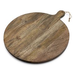 a round wooden cutting board with a handle