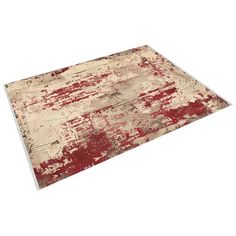 a red and beige area rug on a white background with an old, faded design