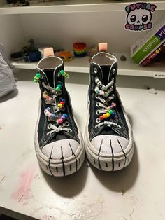 i luv these sm!!!! i made the majority of the little doodles in class or clubs so there are memories :3 Shoe Lace Decoration, Doodling On Shoes, Converse Shoes Decorated, Shoe Ideas For School, Paw Shoes Converse Therian, What To Draw On Converse, Therian Converse, Converse Makeover, Writing On Converse