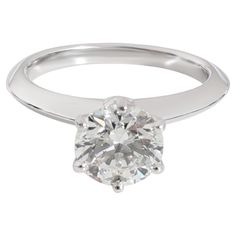 Tiffany & Co. Diamond Engagement Solitaire Ring in Platinum H VS2 1.39 CT PRIMARY DETAILS SKU: 128720 Listing Title: Tiffany & Co. Diamond Engagement Solitaire Ring in Platinum H VS2 1.39 CT Condition Description: Retails for 22600 USD. In excellent condition and recently polished. Ring size is 4.5. Comes with Pouch;Valuation Report;Tiffany Diamond Certificate; Brand: Tiffany & Co. Collection/Series: The Tiffany Setting Metal Type: Platinum Metal Purity: 950 Ring Size: 4.5 Pre-Owned Jewelry Cond Timeless Engagement Ring Tiffany & Co., Co Collection, Tiffany Setting, Tiffany Diamond, Tiffany And Co, Platinum Metal, Solitaire Ring, Tiffany & Co., Ring Verlobung