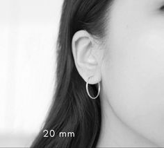 These are beautiful unisex sterling silver hoop earrings in small, medium and large sizes.. Classical elegant hoops of a modern style look amazing for any occasion. Perfect for men and women. They'll surely make a beautiful gift for a beloved one or a new jewelry piece for yourself. These extra small hoop earrings will fit all first hole piercings and of course it is easy to put them on and take off! Details: Pair 2 pieces Diameter - 15mm (2/5 inch), 10mm, 12mm, 8-9mm 925 Sterling Silver A gift Small Silver Hoop Earrings, Cartilage Ring, Helix Hoop, Sterling Silver Hoop Earrings, Huggie Hoop Earrings, Cartilage Earrings, Sterling Silver Hoops, Oxidized Sterling Silver, Silver Man