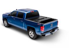 a blue pick up truck is shown on a white background with no people around it