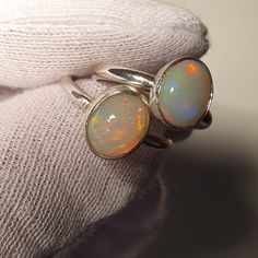 Ethiopian opal ring 925 silver,silver opal ring,Ethiopian opal,genuine opal ring, solid opal ring,handmade opal ring,Natural opal rings We accept Costume orders available in all ring sizes Luxury Handmade Ethiopian Opal Ring, Silver Ethiopian Opal Ring With Cabochon, Handmade Opal Promise Ring, Handmade Round Opal Ring, Handmade Open Opal Ring, Silver Round Opal Ring, Silver Moonstone Ring With Ethiopian Opal, Adjustable Opal Ring, Silver Ethiopian Opal Ring