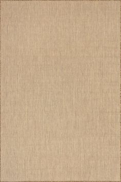 a beige rug with brown border