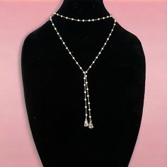 Nwt. Delicate Gold Tone Chain With Stationed White Frosted Faceted Glass Beads. Gray And Black Speckled Triangular Ends. Elegant Beaded Chain Lariat Crystal Necklace, Elegant Crystal Lariat Necklace With Beaded Chain, Elegant Lariat Crystal Necklace With Beaded Chain, Adjustable Beaded Necklaces With Pearl Chain For Party, Adjustable Pearl Chain Beaded Necklaces For Party, Elegant Adjustable Beaded Necklaces, Elegant Adjustable Beaded Necklace, White Lariat Necklace With Beaded Chain, White Beaded Chain Lariat Necklace