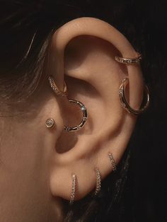 A delicate clicker hoop with front-facing, floating white diamonds. Perfect for the daith, helix, and¬†septum.¬†Sold as a single. SIZE & MATERIALS Composition:¬†14k White gold, white diamond Measurements:¬†huggie outside diameter: 8mm, inside diameter: 6mm,¬†clicker thickness: 0.95mm (19 gauge) Closure:¬†hinge mechanism, clicker closure¬† Read about piercing¬†jewelry and closure systems. Collections Clicker Piercings - Diamond Jewelry - Gold Piercings - Daith Piercing - Helix Piercing - Septum Piercing - Diamond Piercing - 14k Gold Jewelry Diamond Daith Earring, Daith Forward Helix Piercing, Everyday Diamond Huggie Piercings, Dainty Diamond Piercings For Everyday, Dainty Everyday Diamond Piercings, Everyday Yellow Gold Diamond Piercings, Minimalist Diamond Huggie Cartilage Earrings, Fine Jewelry Diamond Huggie Piercings, 14k Gold Huggie Cartilage Earrings With Diamond Accents