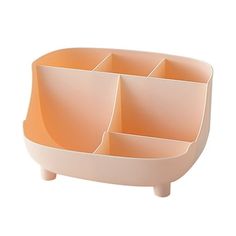 an orange and white tray with four compartments on each side, in front of a white background