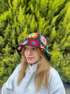 Item Information *Crochet Floral Bucket Hat *You can clean it in wash machine at 30 degrees. *If you have any questions you can contact us. (Customization,size, shipping etc.) Welcome to AlisdaKnit!  We started our journey with my mother we opened a little Instagram page called @alisdaknit for handmade, knitted clothes, crochet clothes; from now on we just started to sell in Etsy. You can find different kinds of designed clothes in our page. Our location is İzmir/ Turkey, but we can ship worldwide. Shipping Information Our page is using express shipping. Delivery Time for Turkey is around 1-3 days, 3-7 days for USA, Canada and 3-7 days for Europe Continent. Shipping is Free Extra Information Contact us for different designs that you desire and if you are seeing an item that out of stock yo Multicolor Crochet Cap Hat, Multicolor Crochet Cap One Size, Multicolor Wide Brim Cloche Hat For Winter, Multicolor Winter Bucket Hat, One-size Multicolor Crochet Cap, Multicolor Crochet Cap In One Size, One Size Multicolor Crochet Cap, Multicolor Yarn Mini Hat One Size, Wide Brim Multicolor Bucket Hat For Winter