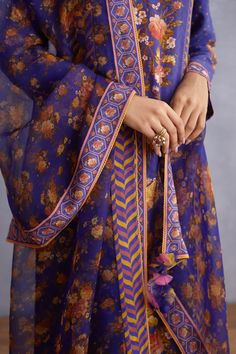 Editor's Note Featuring Purple Jamuni Abhidha Kurta Set Color: Purple Fabric: Original Linen Satin, Pure Cotton silk, Sheer Silk Organza Components: Kurta, pant and dupatta Occasion: Festive and Wedding Guest Care: Dry Clean Only About the Designer Torani by Karan Torani stands handcrafted luxury inspired by the myriad tales of Indian mythology. Torani is a potpourri of all things nostalgic that binds you with a memory long forgotten. The label works with and revives timeless Indian textiles and Silk Designer Palazzo Set For Festivals, Designer Silk Palazzo Set For Festivals, Festive Sharara With Traditional Drape And Printed Motifs, Diwali Sharara With Traditional Drape And Printed Motifs, Diwali Sharara With Printed Motifs And Traditional Drape, Traditional Drape Sharara With Printed Motifs For Diwali, Traditional Palazzo Set With Dupatta And Straight Kurta, Palazzo Set With Dupatta And Straight Kurta For Festivals, Unstitched Chanderi Palazzo Set With Dupatta