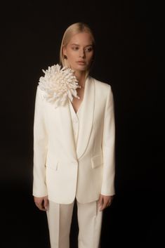 This voluminous brooch is skilfully handcrafted from layers of delicate silk, and brilliantly expresses the essence of flowers in full bloom. Heighten your contemporary bridal look by enriching the lapel of coats and blazers, or the shoulder of your evening gown. Individually handcrafted with love in our atelier, this beautiful flower requires 1-2 weeks for delivery. If time is not on your side, please contact me, and we will do our utmost to meet your deadline. Measurements: *       Length: 23cm  *       Height: 5cm  *       Width: 23cm    Details: *       White *       100% Silk *       Pin fastening *       Handcrafted in Lithuania using millinery techniques  CARE GUIDE  - do not wash - do not iron - do not bleach - do not dry clean - do not tumble ALL OUR ACCESSORIES ARE DELICATE AND H Contemporary Wedding Flowers, Contemporary Bridal, Floral Pins, Chrysanthemum Flower, Wedding Accessory, Contemporary Wedding, Bridal Look, Gifts For My Wife, In Full Bloom