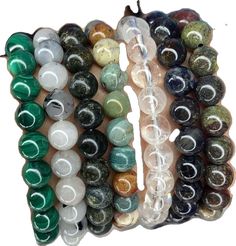 Casual Healing Stretch Bracelet, Flexible Spiritual Beaded Bracelet With Round Beads, Agate Stretch Bracelet With 8mm Beads For Healing, Adjustable Gemstone Beads Stretch Bracelet, Adjustable Agate Stretch Bracelet With Round Beads, Adjustable Stretch Bracelet With Round Beads For Healing, Adjustable Stretch Bracelet With Natural Round Beads, Healing Stretch Bracelet With Spacer And Round Beads, Healing Stretch Bracelet With Spacer Beads