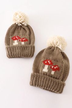 Stay warm and stylish with our tan pompom mushroom beanie! This quirky beanie features a high cable knit design and a playful pompom on top. Perfect for adding a little style to your wardrobe or brining the newest (and tiniest) member of your family home! Mushroom Beanie, Mushroom Hat, Gender Neutral Baby Clothes, Cozy Fall, Gender Neutral Baby, Baby Clothing, Knitting Designs, Stay Warm, Cable Knit