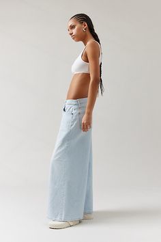 BDG jeans in a vintage-inspired a-line silhouette. Mid-rise style cut with a wide + lightly-cropped leg that widens towards the hem. Find it exclusively at Urban Outfitters. Features A-line BDG jeans with an exaggerated wide-leg Crafted from BDG denim with a hint of stretch for comfort + fit Classic medium rise that sits just below your natural waist Cropped length that hits at the ankle Zip fly + 5-pocket styling UO exclusive Content + Care 99% Cotton, 1% spandex Machine wash Imported Size + Fit Mid rise Wide leg Ankle length Model in Black is 5’10" and wearing size 27 Measurements taken from size 28 Waist: 32" Rise: 10.25" Inseam: 28" Leg opening: 29.25" | BDG Joey A-Line Wide-Leg Jean in Vintage Denim Medium, Women's at Urban Outfitters Spring Cropped Flare Jeans In Medium Wash, Summer Cotton Flare Jeans With Relaxed Fit, Summer Relaxed Fit Cotton Flare Jeans, Denim Blue Wide Leg Flare Jeans For Summer, Spring Light Wash Wide-leg Flare Jeans, Summer Light Wash Flare Jeans With Pockets, Spring Medium Wash Wide-leg Pants, Summer Wide Leg Denim Blue Flare Jeans, Summer Wide Leg Flare Jeans In Denim Blue