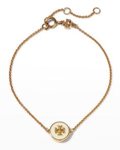 Tory Burch bracelet Gold-tone brass Round enamel inlay Signature double-T logo Adjustable length Spring ring clasp Imported Tory Burch Bracelet, Dream Wishlist, Bath Body Works Candles, Diy Clothes And Shoes, Tory Burch Kira, Tory Burch Jewelry, Jewelry Accessories Ideas, Classy Jewelry, Accessories Ideas