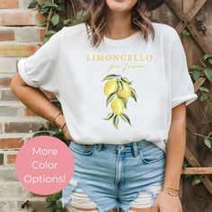 This Limoncello Por Favore Shirt, a delightful blend of style and zest, perfect for those who appreciate the finer things in life. This Lemon T-Shirt combines a fresh, vibrant design with the playful phrase "Limoncello Por Favore," making it a standout piece in any wardrobe. It's a charming nod to Italy's beloved lemon liqueur, Limoncello, and a stylish way to show appreciation for Italian culture. All of our shirts are made with the highest quality materials and are super soft and cozy! ♥ HOW T White T-shirt With Lemon Print For Summer, Casual Cotton T-shirt With Lemon Print, Casual Lemon Print Tops For Spring, Yellow Relaxed Fit T-shirt For Spring, Yellow T-shirt With Lemon Print For Spring, Yellow Tops With Funny Print For Spring, Casual Lemon Tops For Summer, Casual Crew Neck Top With Lemon Print, Summer Lemon Print Crew Neck Top