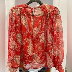 Zara Size L Long Sleeve Pullover Too Made Of 100% Polyester. Red With Cream Paisley Prints Never Worn. Single Fabric Button On Back. Summer Red Blouse With Paisley Print, Red Bohemian Blouse With Paisley Print, Red Long Sleeve Blouse With Paisley Print, Red Bohemian Tops With Paisley Print, Red Bohemian Paisley Print Tops, Red V-neck Blouse With Paisley Print, Casual Red Tops With Paisley Print, Casual Red Paisley Print Top, Zara Tops