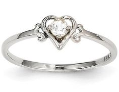 a heart shaped diamond ring on a white background