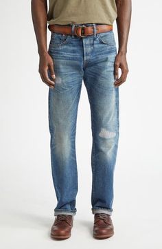 Ripped, repaired and eminently relaxed, these jeans cut from premium nonstretch selvedge denim sport a slimmer fit in the thighs that flares to a classic bootcut profile. 33" leg opening; 11" front rise; 14 1/2" back rise Button fly Five-pocket style 100% cotton Machine wash, line dry Made in the USA Designer Clothing Rugged Fitted Straight Leg Jeans, Rugged Fitted Jeans With Five Pockets, Rugged Relaxed Fit Straight Leg Jeans, Rugged Straight Leg Relaxed Fit Jeans, Rugged Selvedge Straight Leg Jeans, Classic Fitted Distressed Jeans, Rugged Five-pocket Rigid Denim Jeans, Rugged Five-pocket Jeans In Rigid Denim, Fitted Faded Selvedge Jeans