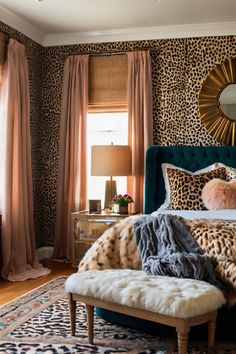 a bedroom with leopard print walls and furniture