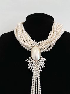 This one-of-a-kind dream necklace is created with multiple strands of freshwater pearls. The centerpiece is a unique, antique brooch made with 14k yellow gold and Mobé cultured pearls. This necklace is about 18" long, and the brooch measures at 3 1/2" x 2" Dream Necklace, Antique Brooches, Cultured Pearls, Freshwater Pearls, Beaded Jewelry, Pearl Necklace, Statement Necklace, Yellow Gold, Yellow