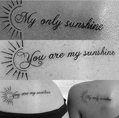 two women with sun tattoos on their stomachs and one has the words you are my sunshine