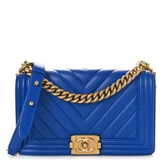 This is an authentic CHANEL Calfskin Chevron Quilted Medium Boy Flap in Bright Blue. This chic shoulder bag is crafted of smooth calfskin leather in blue. The bag features a gold chain shoulder strap with a leather shoulder pad, a chevon-quilted flap with a linear-quilted border, and a gold Boy CC push lock. This opens to a blue fabric interior with a flat pocket. Blue Chanel, Boy Chanel, Moda Chanel, Expensive Bag, Mode Chanel, Chanel Cruise, Blue Boy, Chanel Shoulder Bag, Chanel Spring