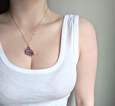 Raw amethyst is a classic in the world of gemstones. It is one of the more affordable stones with the most vibrant natural spectrum of purple tones. I have this necklace in both tiny crystals and large crystals, and a few different chain lengths 💟 **This listing is for only one necklace Each large crystal pendant measures approximately 1 inch in length.💜 Each small amethyst measures between 1/4 and 1/2 inch in length 💜 The chain for ThIs necklace measures 18 inches in length. You can purchase Purple Crystal Necklace, Amethyst Crystal Necklace, Jewelry Purple, Amethyst Quartz Crystal, Necklace Amethyst, Purple Tones, Purple Necklace, Raw Amethyst, Large Crystal