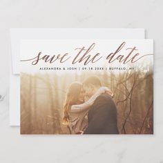 save the date postcard with an image of two people hugging in front of trees