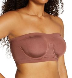 This bandeau bra features fabulous support, thanks to the underwire and compression from the advanced knit. Seamless, stretchy unlined (unpadded) underwire cups are comfortable and soft. Knit-in underband and elastic top band. give added security. Special knit-in area between cups gives extra breathability. Seamless sides for a smooth look under clothes. Strapless profile is a no-show under strapless tops. Fit Note: For a great fit that doesn't roll up and looks smoother, step into your bra, pul Eileen West, Swim Brands, Elastic Top, Top Band, Bandeau Bra, Sport Bra Top, Strapless Tops, Underwire Bra, Bra Sizes