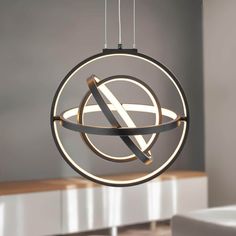 a circular light fixture hanging from the ceiling