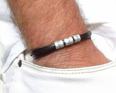 "Custom engraved leather bracelet for men. A gift for father. Personalized leather bracelet with rings. this personalized bracelet is a perfect gift for father, brother, boyfriend. This bracelet is a perfect gift for a man. The bracelet will remind him every day that you love him. This engraved bracelet reminds you of people and dates that are important to you. It can make him smile and be happy. P E R S O N A L I Z E Engraving is done by hand, it is deep and has a permanent color. You can write Silver Engraved Leather Bracelets For Father's Day, Silver Engraved Leather Bracelet For Father's Day, Leather Bracelet For Father's Day Gift, Leather Bracelet Gift For Father's Day, Personalized Engraved Leather Jewelry, Father's Day Leather Strap Bracelet Gift, Father's Day Gift Bracelet With Leather Strap, Father's Day Engraved Silver Leather Bracelet, Personalized Silver Leather Bracelet