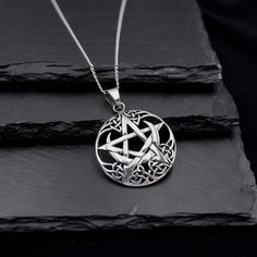 Real 925 Sterling Silver Celtic Moon Pentagram Necklace This simple yet elegant necklace features a sterling silver Celtic Moon Pentagram on a Dainty Sterling silver cable chain. Charm Measures 38 x 27mm Jewelry will come in a gift box * Please read shop policy before placing an order * *JEWELRY CARE* Sterling Silver will tarnish over time, but to help keep your jewelry looking beautiful - Clean with a soft dry cloth after wear and store inside an airtight bag or container. Remember to remove yo Gothic Sterling Silver Clavicle Necklace, Gothic Sterling Silver Clavicle Chain Necklace, Sterling Silver Gothic Clavicle Necklace, Sterling Silver Gothic Collar Necklace, Gothic Sterling Silver Necklaces, Gothic Sterling Silver Necklaces In Silver, Engraved Sterling Silver Star Of David Necklace, Gothic Silver Round Necklace, Silver Gothic Round Necklace