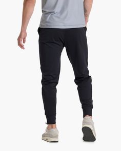 A fresh take on athleisure and a staple in your wardrobe, the Sunday Performance Joggers are premier in fit, function and soft stretch. This jogger style will keep you moving with less bulk around your ankles. | Vuori Sunday Performance Jogger Pants | Black | Medium Vuori makes premium performance apparel inspired by the active Coastal California lifestyle; an integration of fitness, surf, sport, and art. Breaking down the boundaries of traditional activewear, we are a new perspective on perform 4-way Stretch Sportswear Joggers With Side Pockets, Athleisure Joggers With 4-way Stretch And Elastic Side Panels, Athleisure Activewear With Comfort Stretch And Elastic Side Panels, Athleisure Activewear With Comfort Stretch, Black Comfort Stretch Joggers For Jogging, Athleisure Pants With Elastic Side Panels, Black Comfort Stretch Joggers, Sportswear 4-way Stretch Joggers With Side Pockets, Sporty 4-way Stretch Sweatpants With Side Pockets