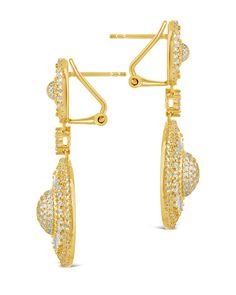 Make a statement whenever you drop into the room! Our Jessica Statement Earrings sparkle with CZ stones and are perfect for adding some serious sass to any look. Materials: 14K gold or rhodium plated brass, cubic zirconia Features: 1.7" drop, 0.5" stud, 0.5"-0.85" width, 1mm-3mm stones, Lead & Nickel free, post back Diamond Pave Setting Earrings For Party, Gold Diamond Chandelier Earrings, Elegant Evening Dangle Earrings With Pave Setting, Evening Dangle Earrings With Pave Setting, Elegant Gold Cluster Earrings With Pave Setting, Dazzling Gold Cluster Earrings With Diamond Accents, Gold Cubic Zirconia Chandelier Earrings, Cubic Zirconia Bridal Earrings With Pave Setting For Evening, Evening Pave Setting Drop Earrings