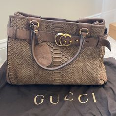 Gucci Tote- Tan Suede Python Bag In Excellent Condition Pre-owned Gucci Leather Bag, Pre-owned Top Handle Leather Bags, Luxury Pre-owned Satchel Bag, Pre-owned Rectangular Gucci Bag, Pre-owned Luxury Leather Shoulder Bag, Luxury Pre-owned Shoulder Bag With Double Handle, Luxury Pre-owned Double Handle Shoulder Bag, Pre-owned Gucci Leather Shoulder Bag, Luxury Pre-owned Bags For Shopping