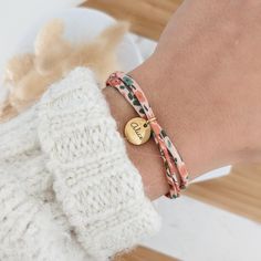 "Our catalog of graphics & illustrations to engrave: https://tinyurl.com/bliche * Adjustable bracelet in 100% Liberty cotton cord * 12mm stainless steel medals (10mm for child size) - do not rust, resist over time and are hypoallergenic * Adjustable bracelet thanks to sliding knots and adjustable to all wrists ⭐ CUSTOMIZATION - * Choose the number of medals you want, single-sided, or double-sided * Fill in the word(s) / picto / date to be engraved for the medal as well as the font and the size ( Wrist Bracelet Mom, Affordable Adjustable Bracelets For Mother's Day, Mother’s Bracelet, Adjustable Name Bracelets As Gifts, Fabric Bracelets Diy, Liberty Bracelet, Cotton Cord Bracelet, Mom Jewelry Personalized, Fabric Bracelets