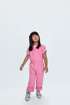 Playground proportions. Our best selling jumpsuit silhouette, reimagined for Little Grovers. Designed for a unisex relaxed fit, with button up front closure and an adjustable button waist flap. Flamingo is our signature pink that's quickly become a cult classic color. Playwear Jumpsuits And Rompers With Pockets, Cotton Jumpsuits And Rompers With Pockets For Playwear, Playwear Overalls Jumpsuits And Rompers With Pockets, Casual Short Sleeve Jumpsuits And Rompers For Play, Casual Short Sleeve Jumpsuit For Playwear, Short Sleeve Relaxed Fit Jumpsuit With Side Pockets, Relaxed Fit Jumpsuit With Side Pockets And Short Sleeves, Relaxed Cotton Denim Jumpsuit For Loungewear, Cotton Denim Jumpsuit In Relaxed Fit For Loungewear