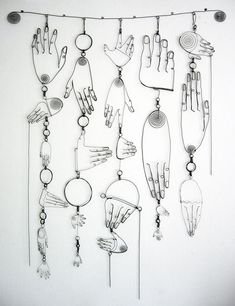 a group of metal objects hanging on a wall